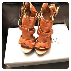 Brown leather  platform stilettos worn once